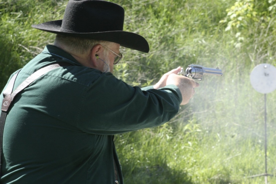 club member participating in cowboy action shooting demonstration